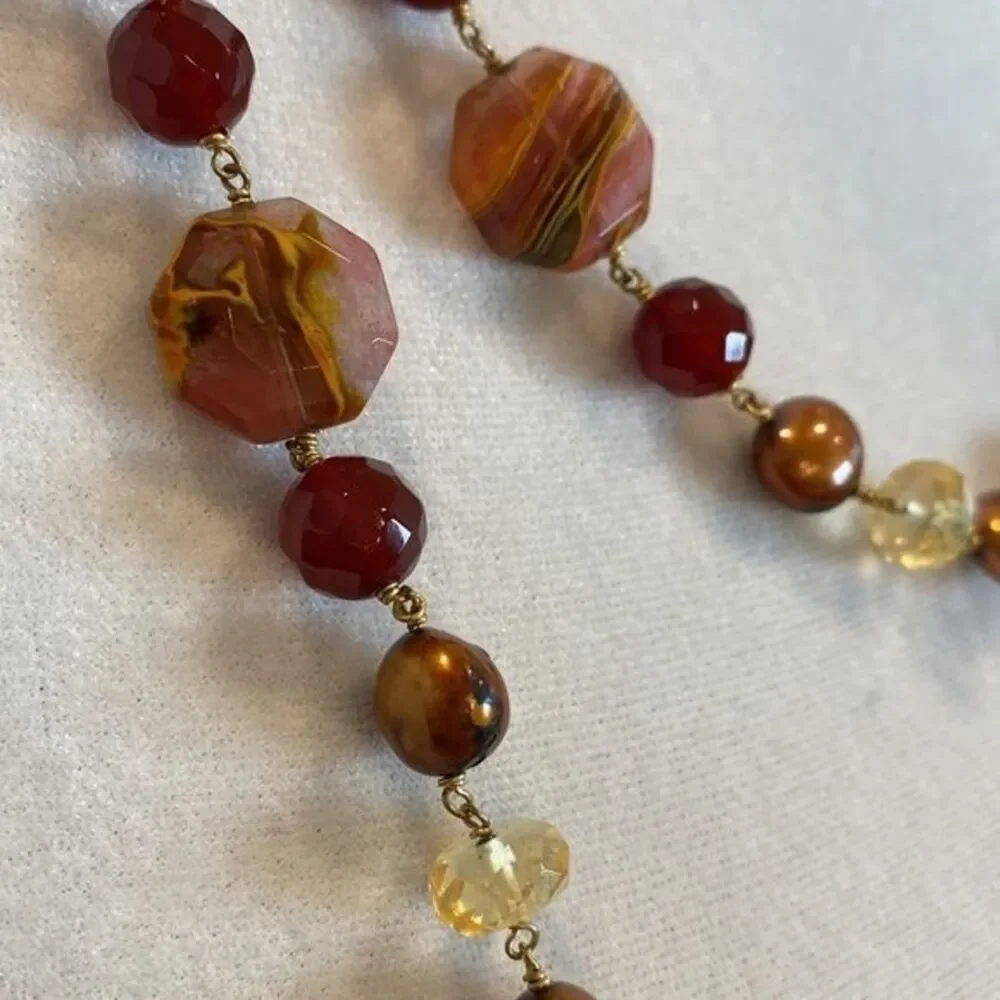 Double strand necklace Unique blend of beads and pearls. Toggle closure